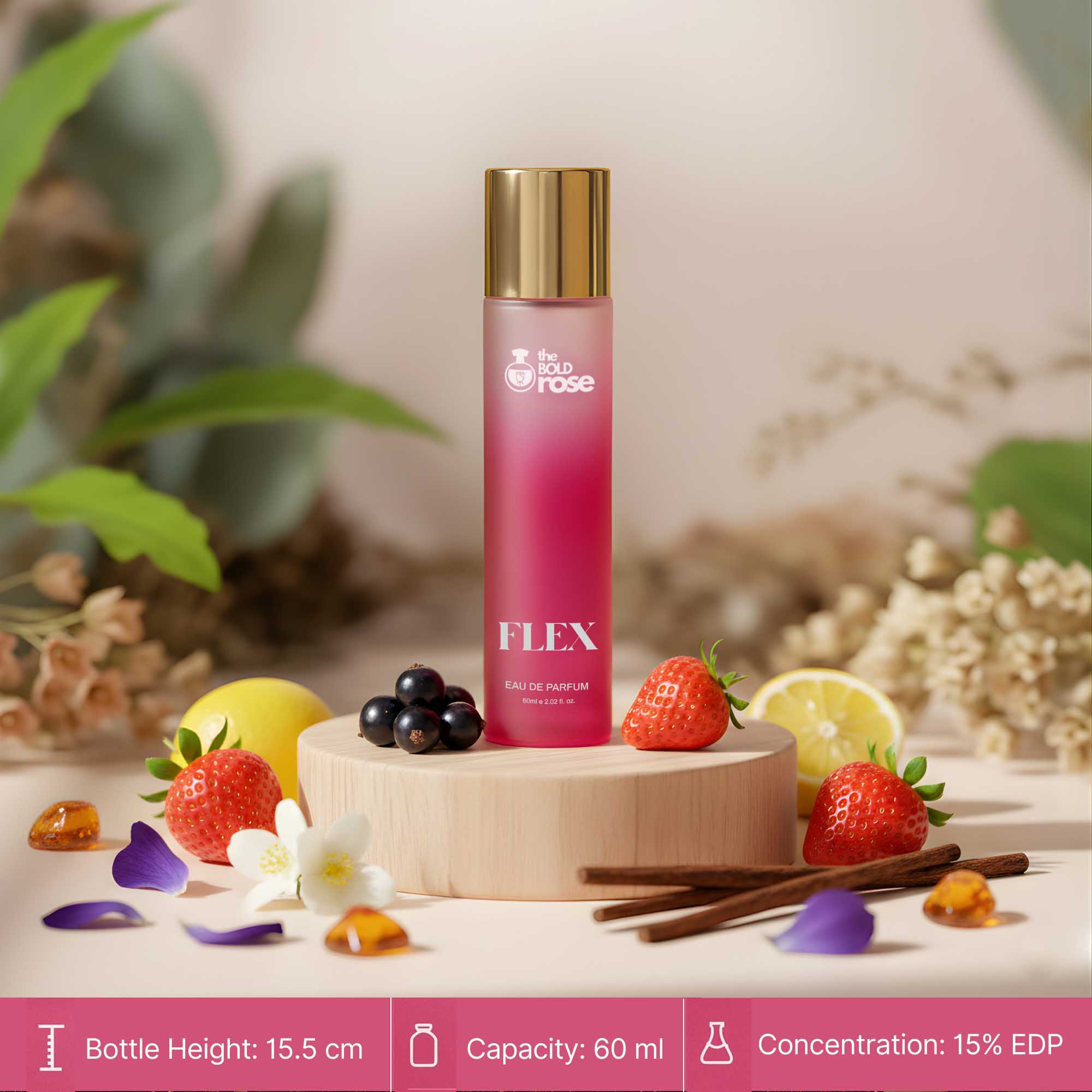 The Bold Rose Flex perfume bottle displayed with its real ingredients — strawberry, lemon, black currant, jasmine and vanilla.