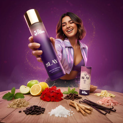 College girl holding The Bold Rose Slay perfume surrounded by its real fragrance ingredients like lemon, mint, vanilla, ginger and florals.